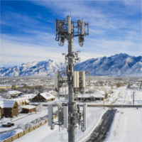 PIM mitigation absorber installed on cellular antenna for backlobe suppression